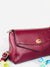 maroon leather bags detail